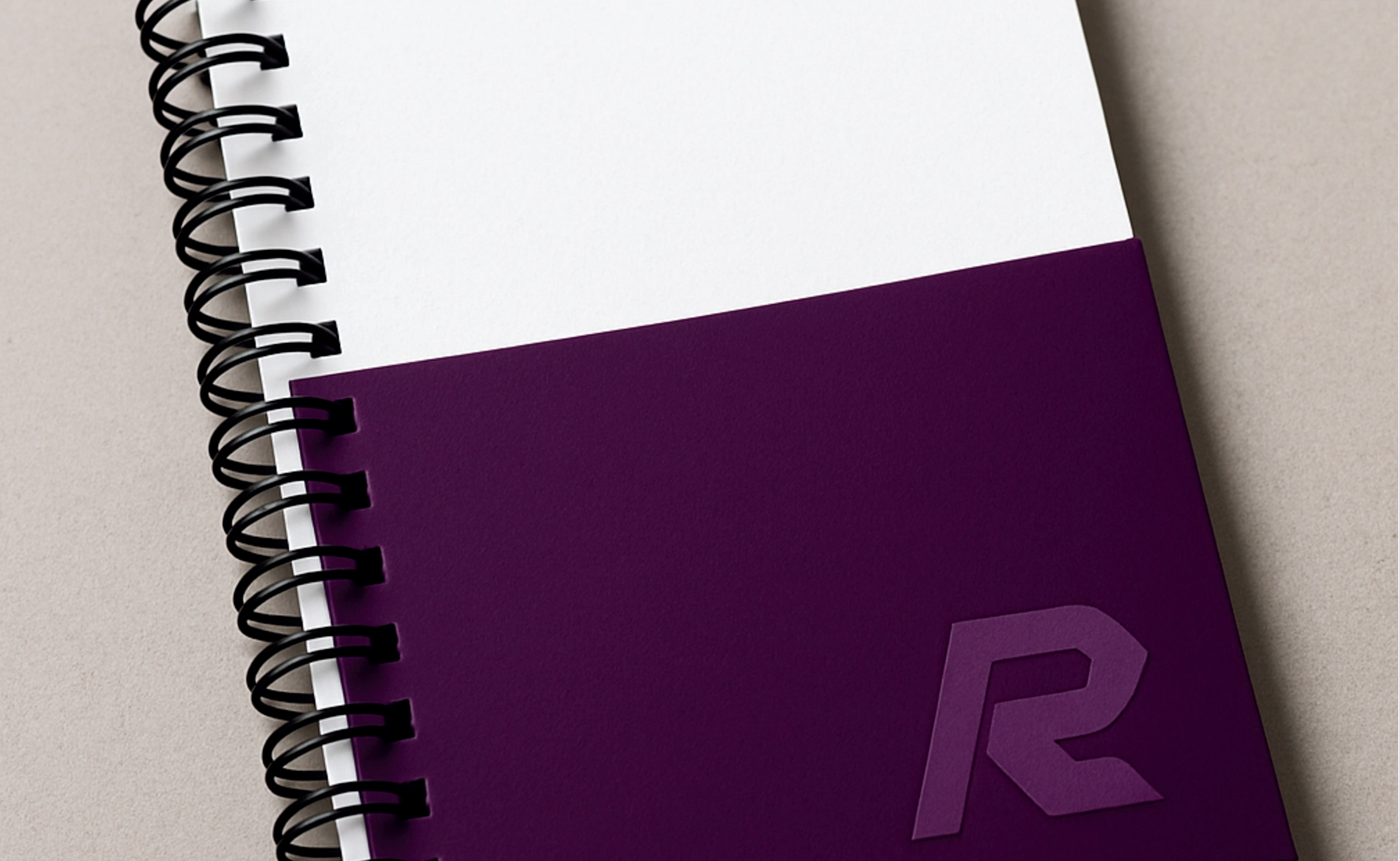 Rank Industries branded spiral bound book